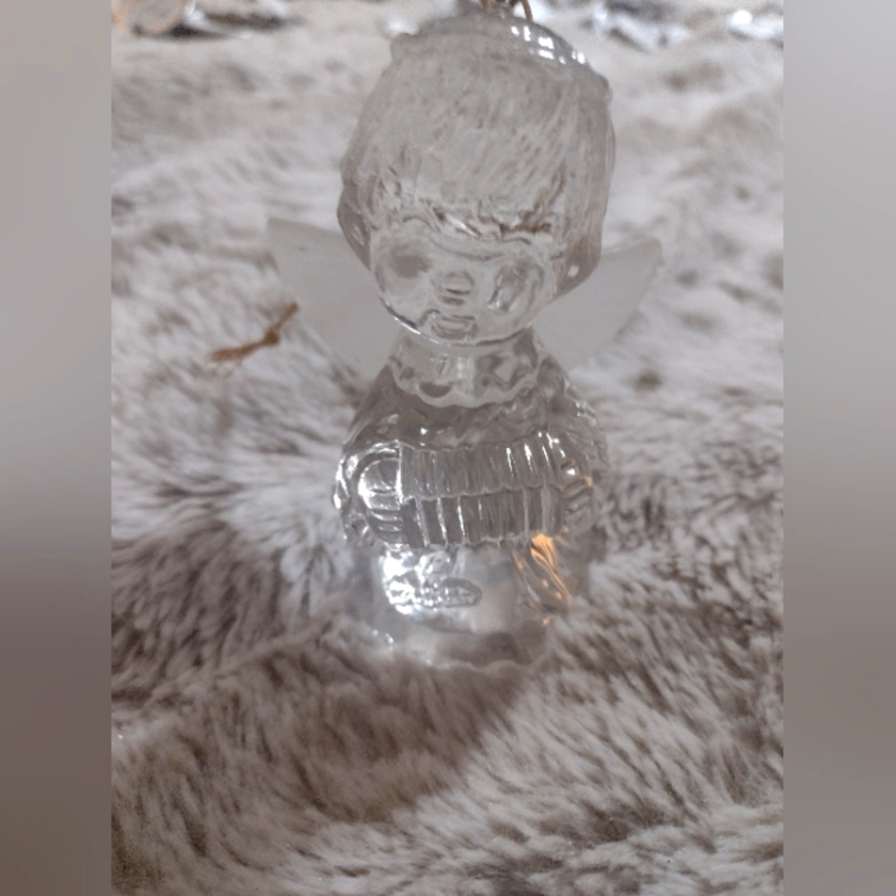 A bag of Ornaments and Clear Angel and Vintage Soldiers Head